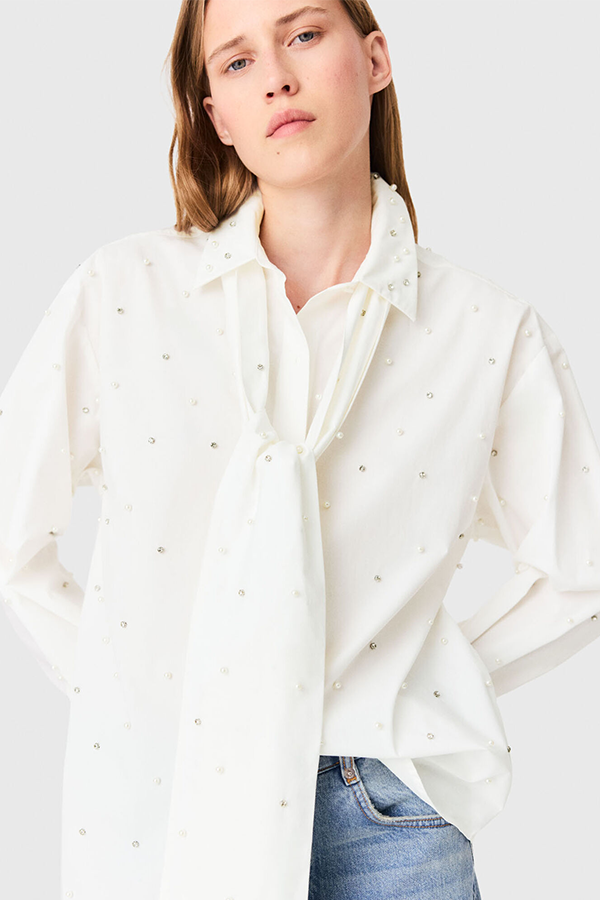 Blouse embellished with pearls and rhinestones