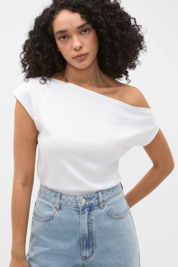 Elevated with a soft drape design, this top is an effortless addition to your everyday style. Crafted in a lightweight blend with a smooth finish, it features an asymmetric neckline and a relaxed fit through the body. Pair with jeans for a casual look, or opt for a tailored pant. This product contains TENCELÂ Modal fibres. The wood used as raw material for all TENCELÂ Modal fibres is sourced from certified (FSCÂ® or PEFC certification*) or controlled wood sources. *FSCÂ® (FSC-C041246) or PEFC (PEFC/06-33-92) certification. TENCELÂ is a trademark of Lenzing AG.