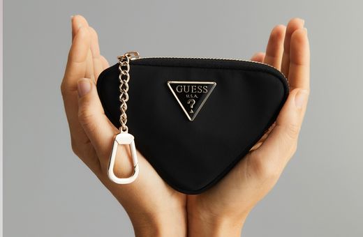 Strand Receive a Gift With Any Guess Handbag Purchase