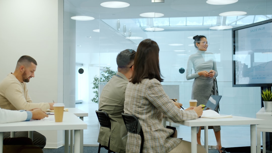 Manager briefing shift-based employees on health benefits and coverage options