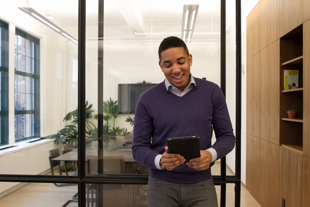 Manager scheduling shifts and checking team updates on a tablet