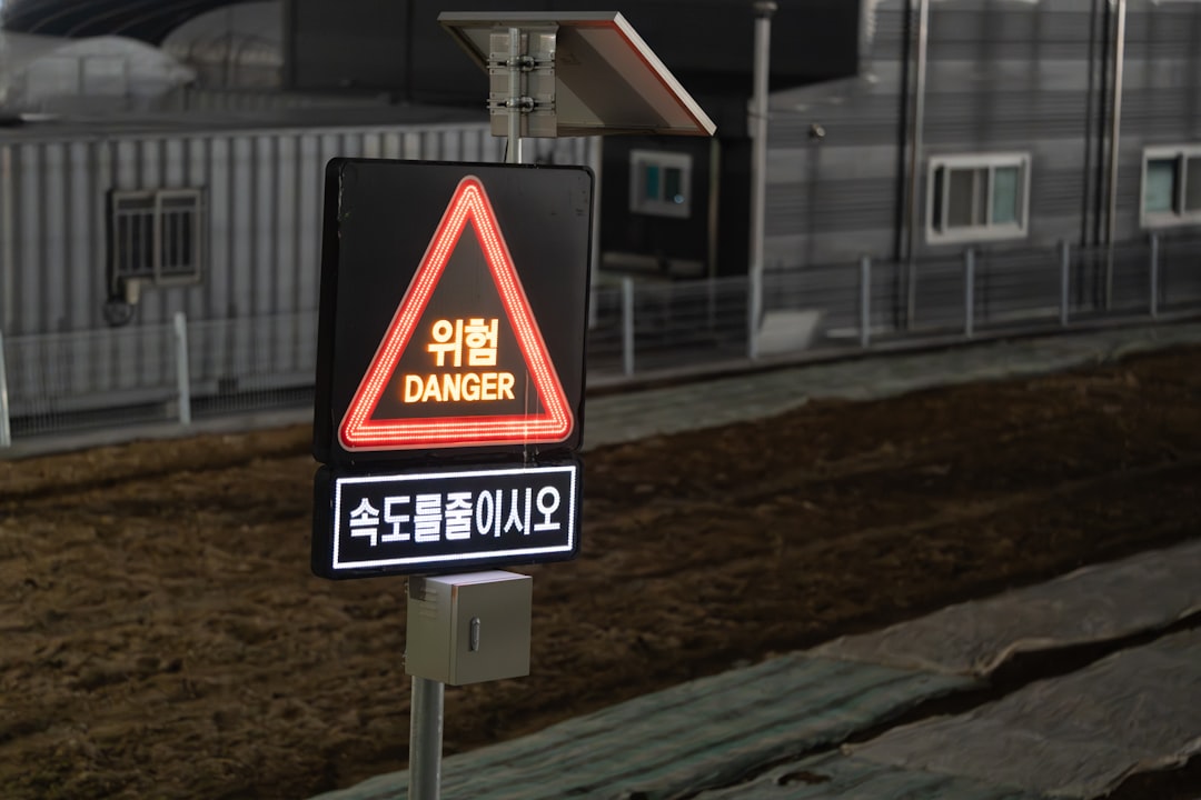 Safety signs in multiple languages supporting clear workplace communication