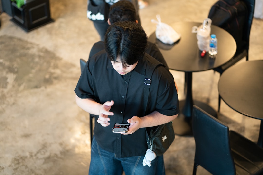 Restaurant worker using a mobile app to swap shifts and manage rota changes