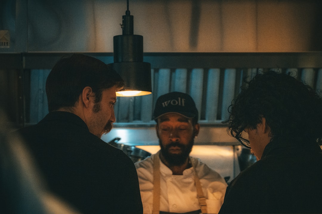 Restaurant team collaborating before service to support communication across shifts