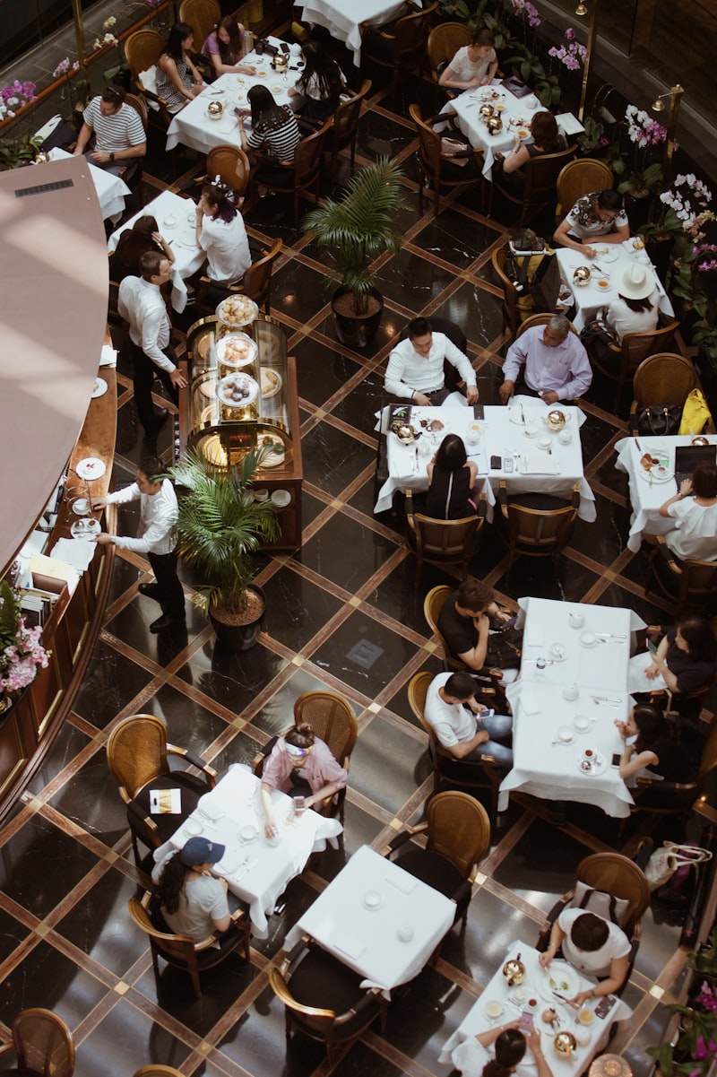 Server taking orders from restaurant guests