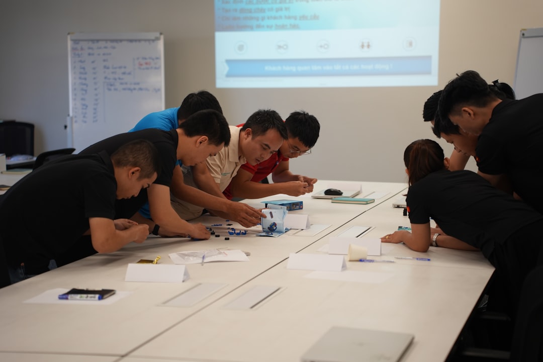 Multicultural shift team collaborating during a workplace briefing