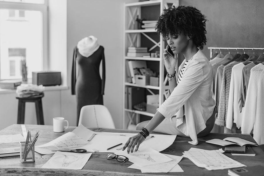 Black business woman on phone