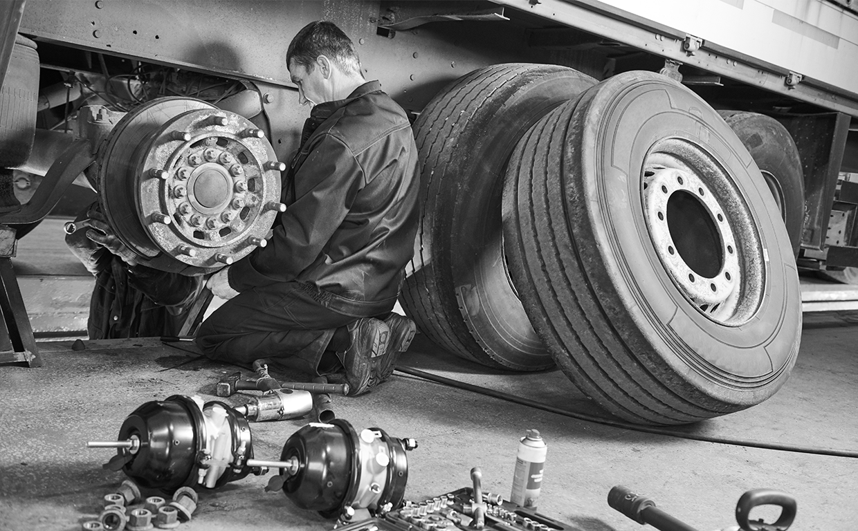 mechanic working on a truck