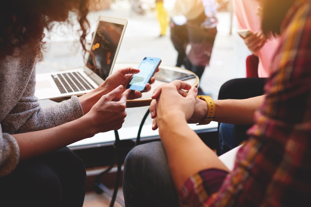 Employees collaborating using a mobile device