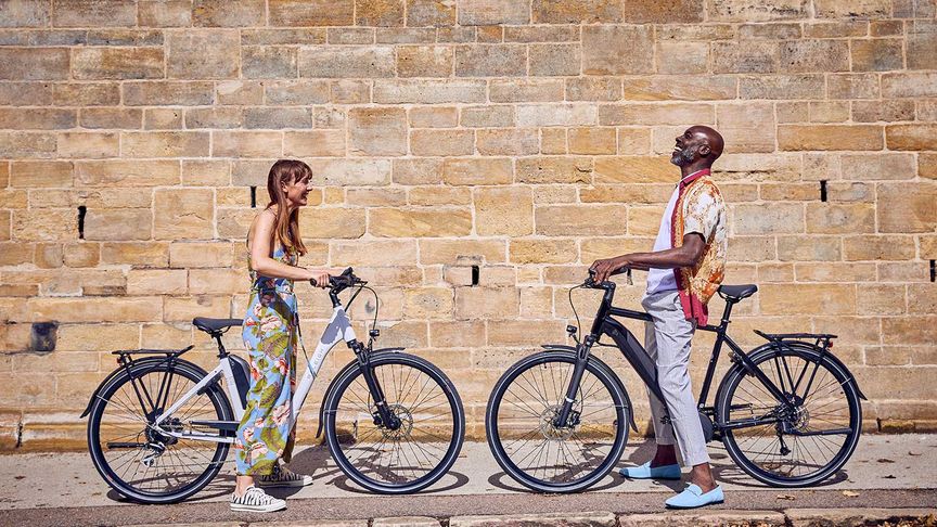 A couple with the Raleigh Motus and Centros ebikes