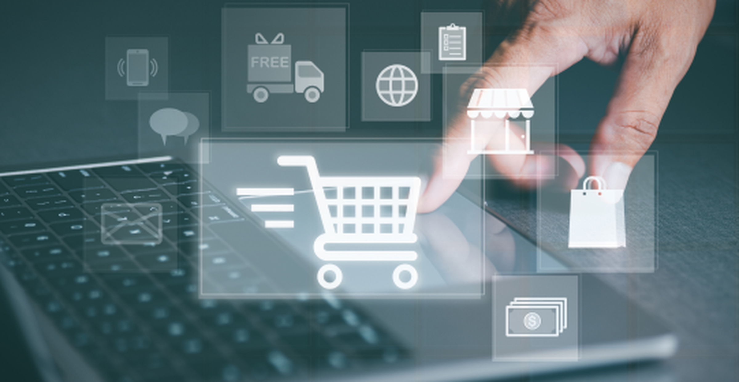 hand using a laptop, several icons related to shopping are floating in the foreground