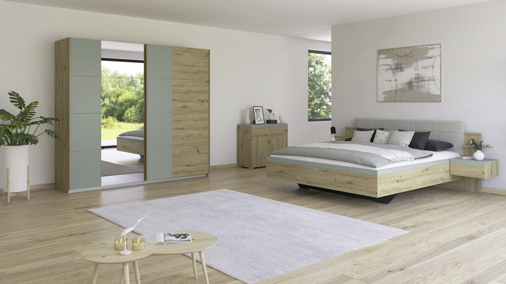 Ein helles Schlafzimmer mit Möbeln der rauch ORANGE-Serie Saldana in Artisan Eiche Nachbildung mit Absetzungen in Salbei