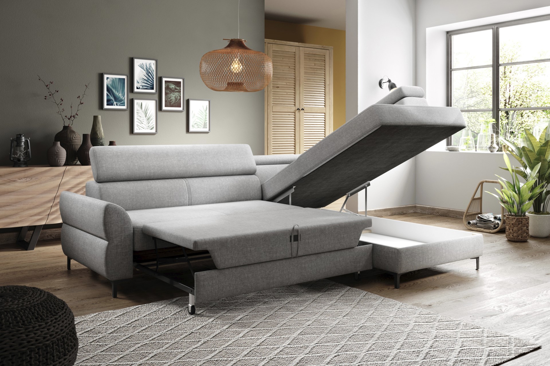 Ecksofa Remo in Grau mit Schlafoption durch Frontauszug und einem Bettkasten in einem Wohnzimmer im Boho-Stil