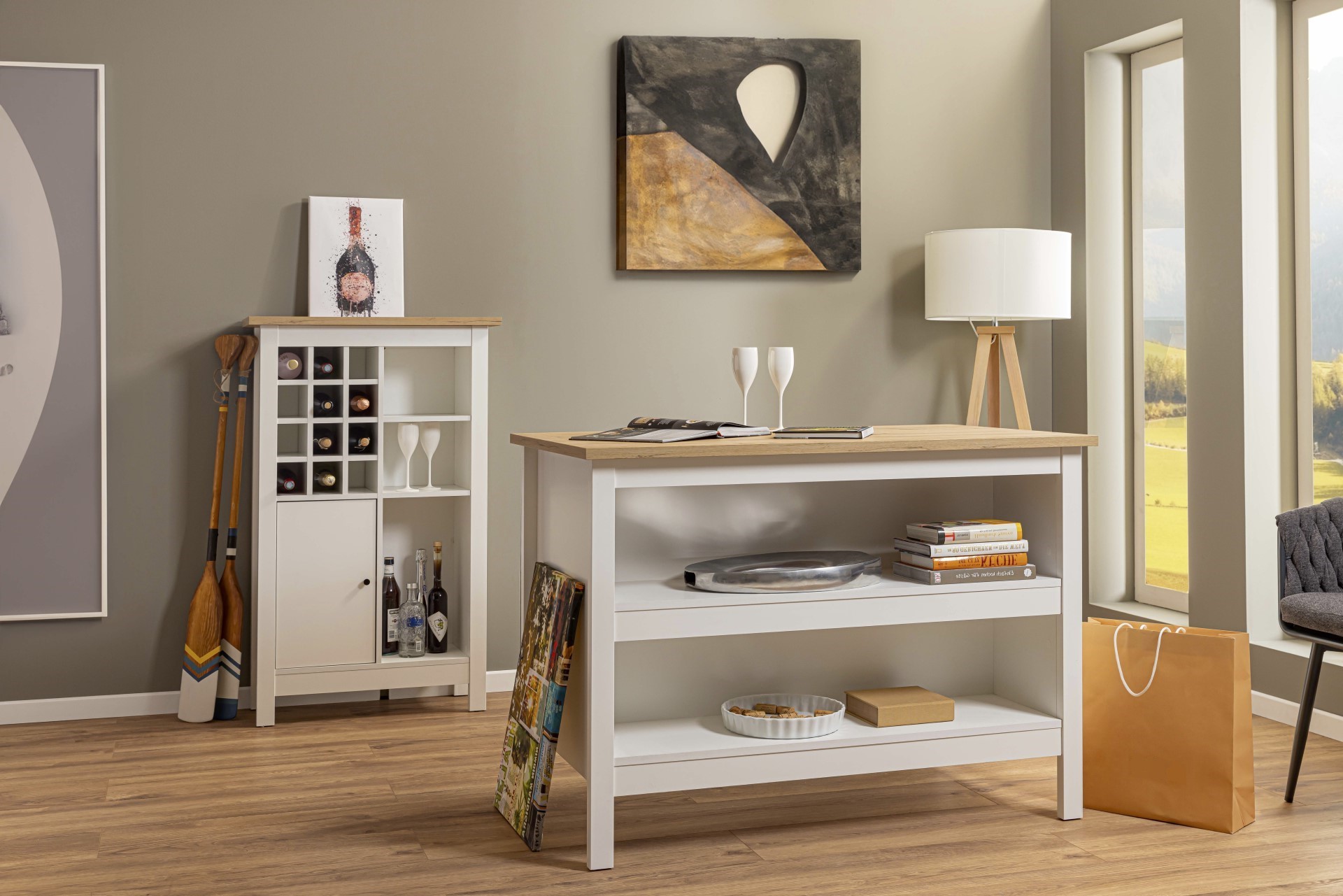 Weinschrank Julina von Inter Link aus weißer Holzoptik in einem modern gestalteten Arrangement mit einer weiteren Kommode