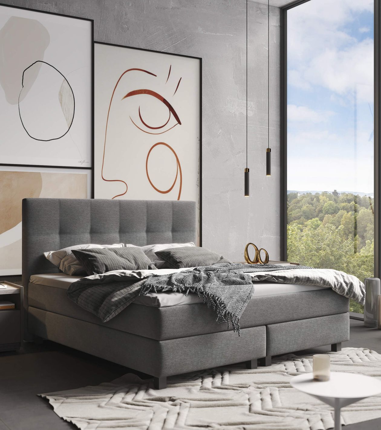 Modernes Schlafzimmer mit grauem Boxspringbett, großen Kunstwerken an der Wand und einem großen Fenster mit Blick auf Bäume und blauen Himmel.