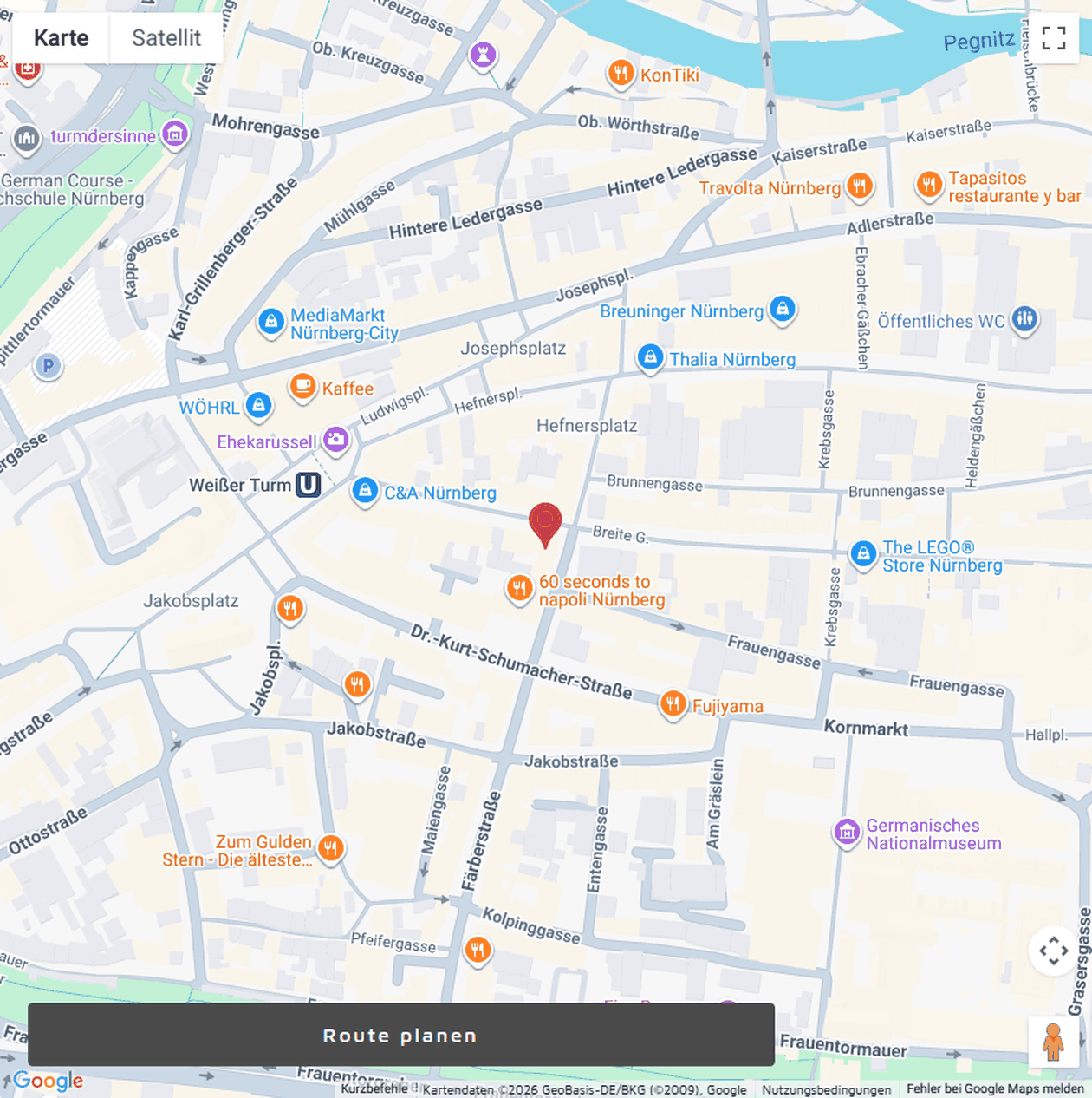 Karte der Nürnberger Innenstadt mit Hervorhebung von Geschäften sowie einer Routenplanungsoption.