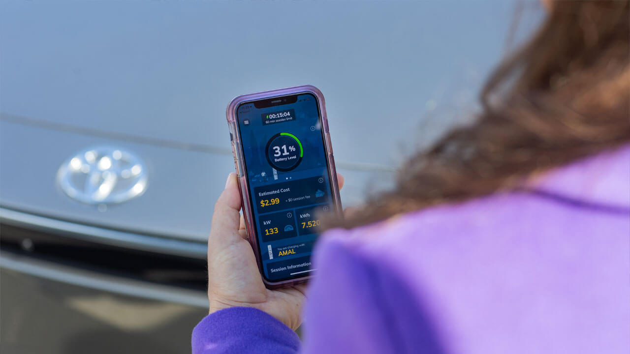 Person looking at EVgo App on their phone
