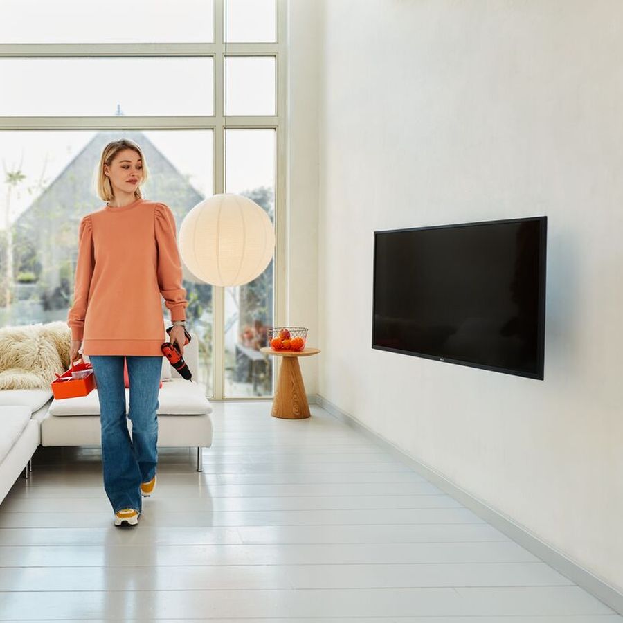 Accrocher TV au Mur : Astuces pour Fixer télé au Mur | Vogel's