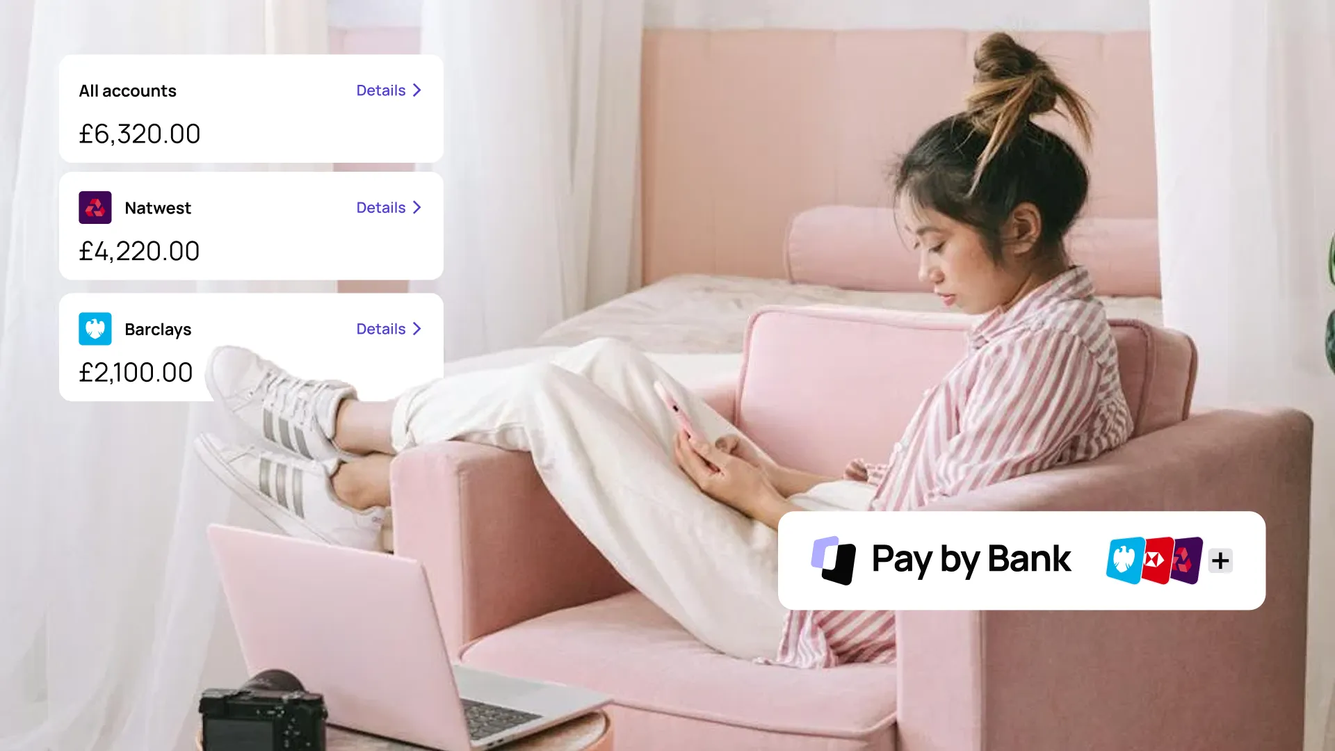 Woman in pink pajamas using a phone on a sofa next to a laptop. Bank account details and "Pay by Bank" logo displayed on the side.