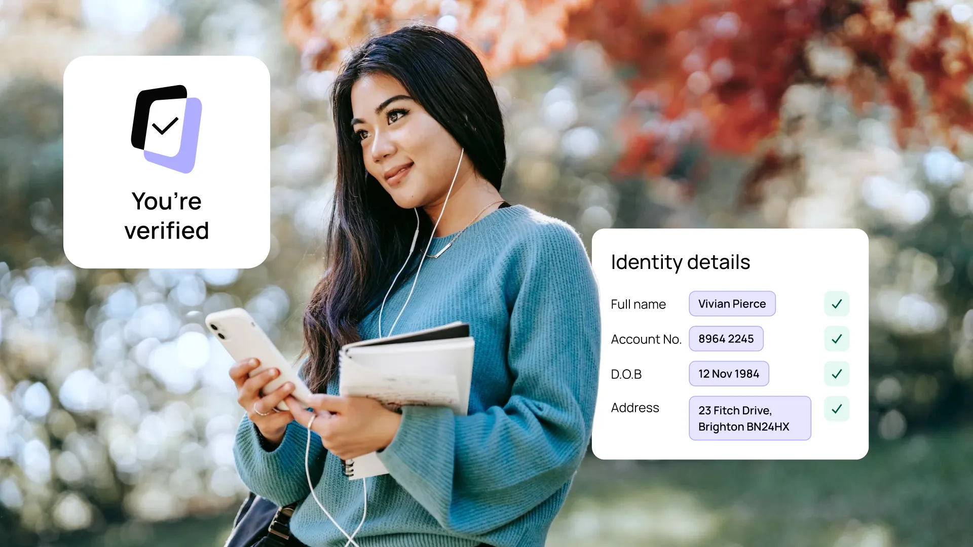 Woman with smartphone and notepad, wearing earbuds, stands outdoors. Overlay shows verified identity details.