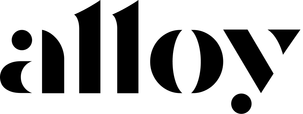 A black musical note symbol with a detailed, stylized treble clef design serves as a decorative element on a plain white background.