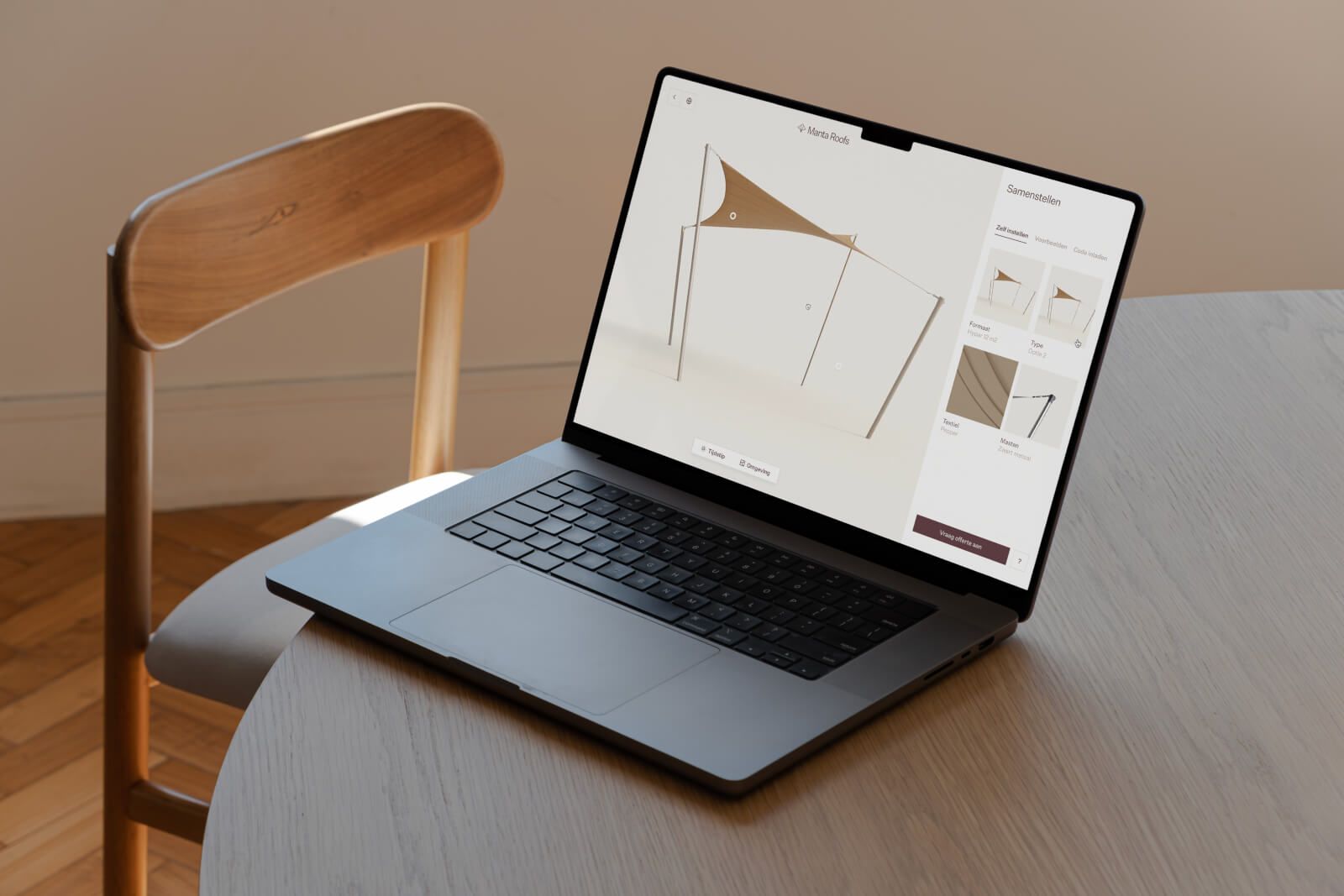 A laptop on a wooden table displaying a design application with a canopy structure, next to a wooden chair on a wooden floor.