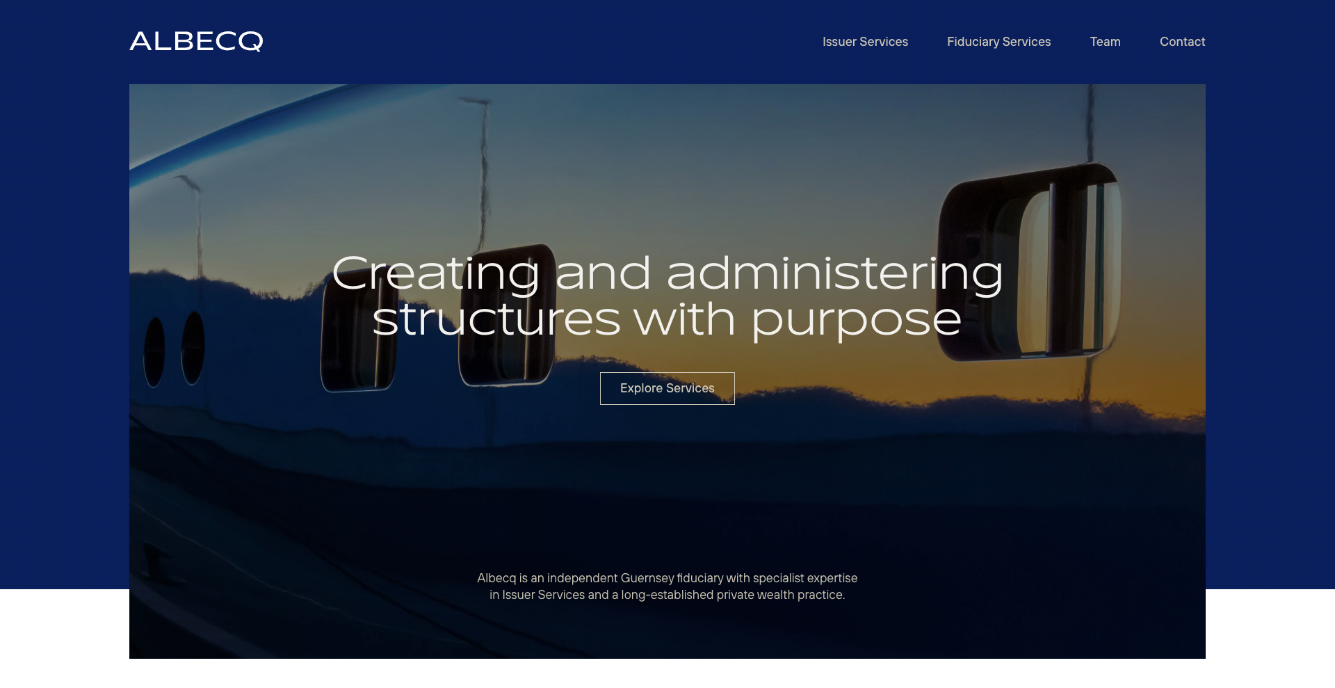 A website homepage for Albecq displaying text "Creating and administering structures with purpose" over an image of a jet reflecting a sunset.