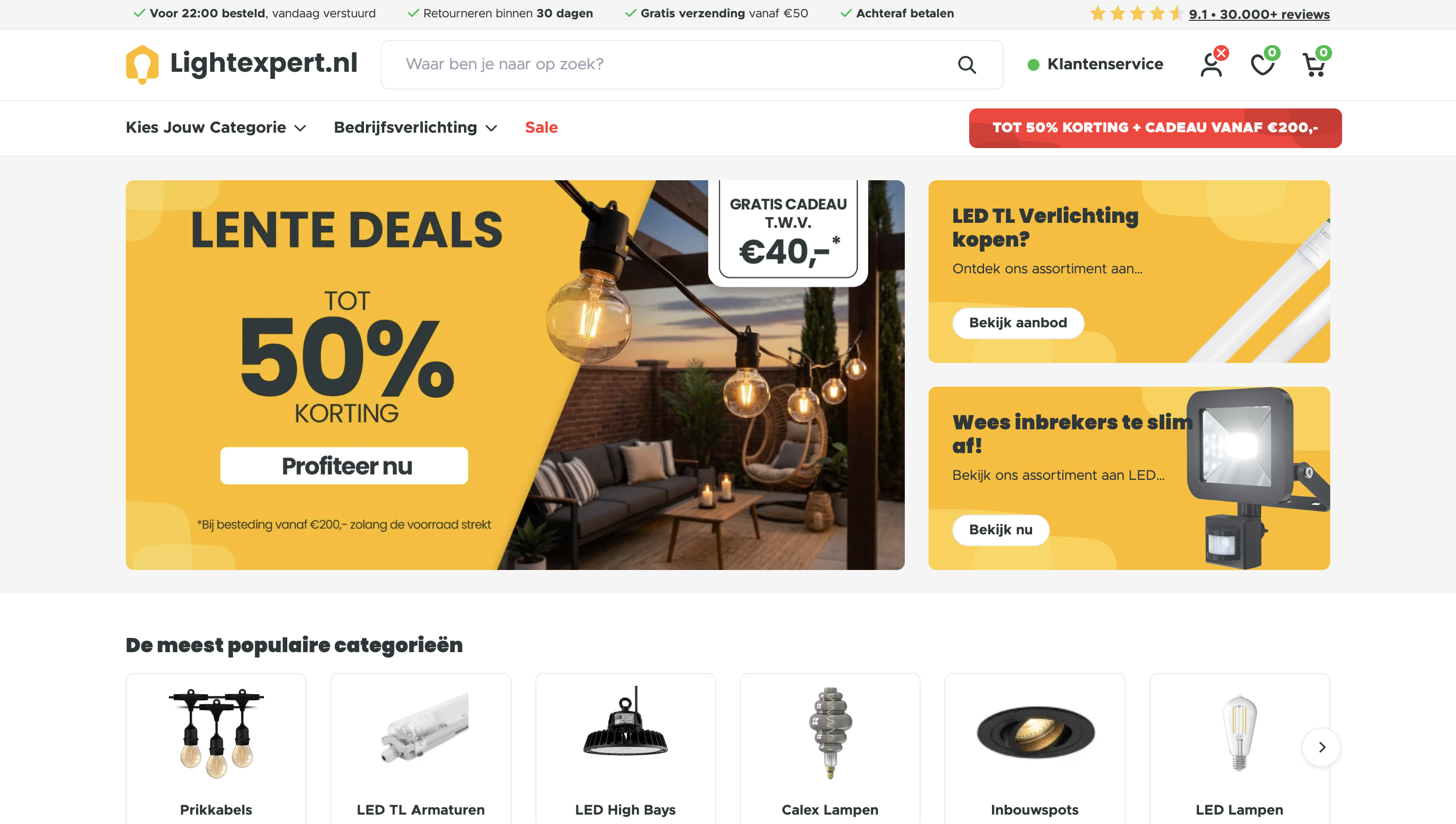 Homepage of Lightexpert.nl displaying spring deals with up to 50% off. Includes various lighting products and promotional banners.