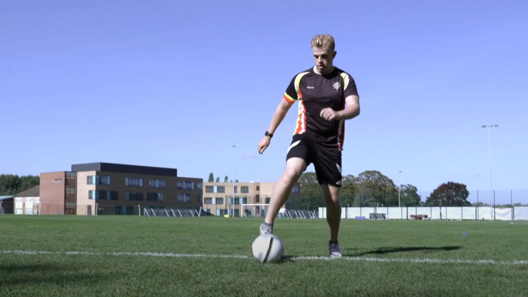 Chris playing football