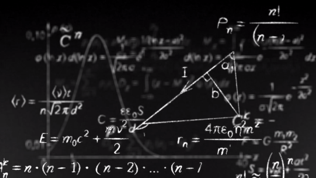 Maths video screenshot of chalk board with formulas