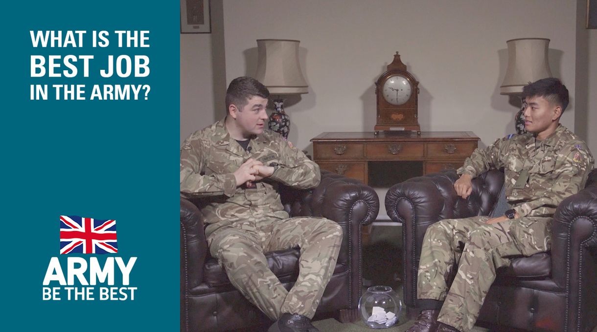 Two soldiers in uniform sit on leather chairs, talking. A sign reads "What is the best job in the army?" with a British flag logo.