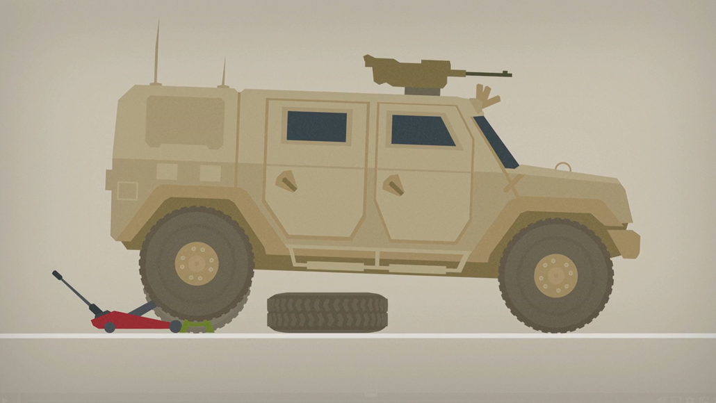 Animation still of an army vehicle having its wheel changed