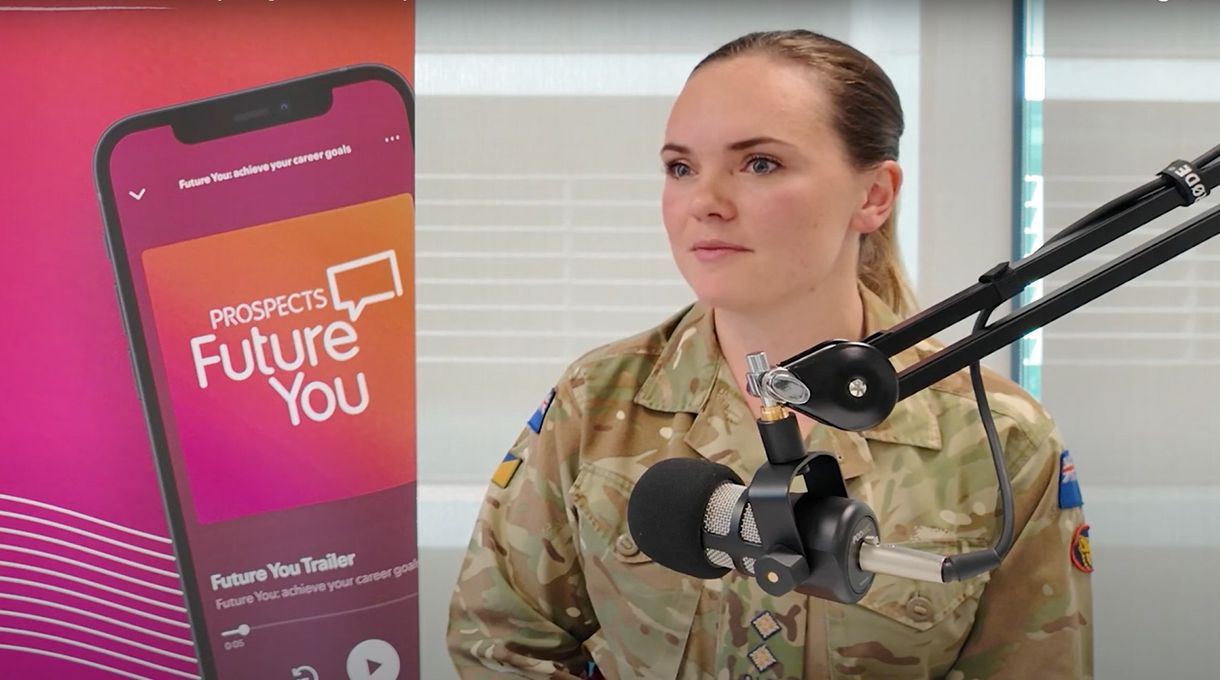 A person in military uniform speaks into a microphone. A smartphone screen displays "Prospects Future You" on a pink background.