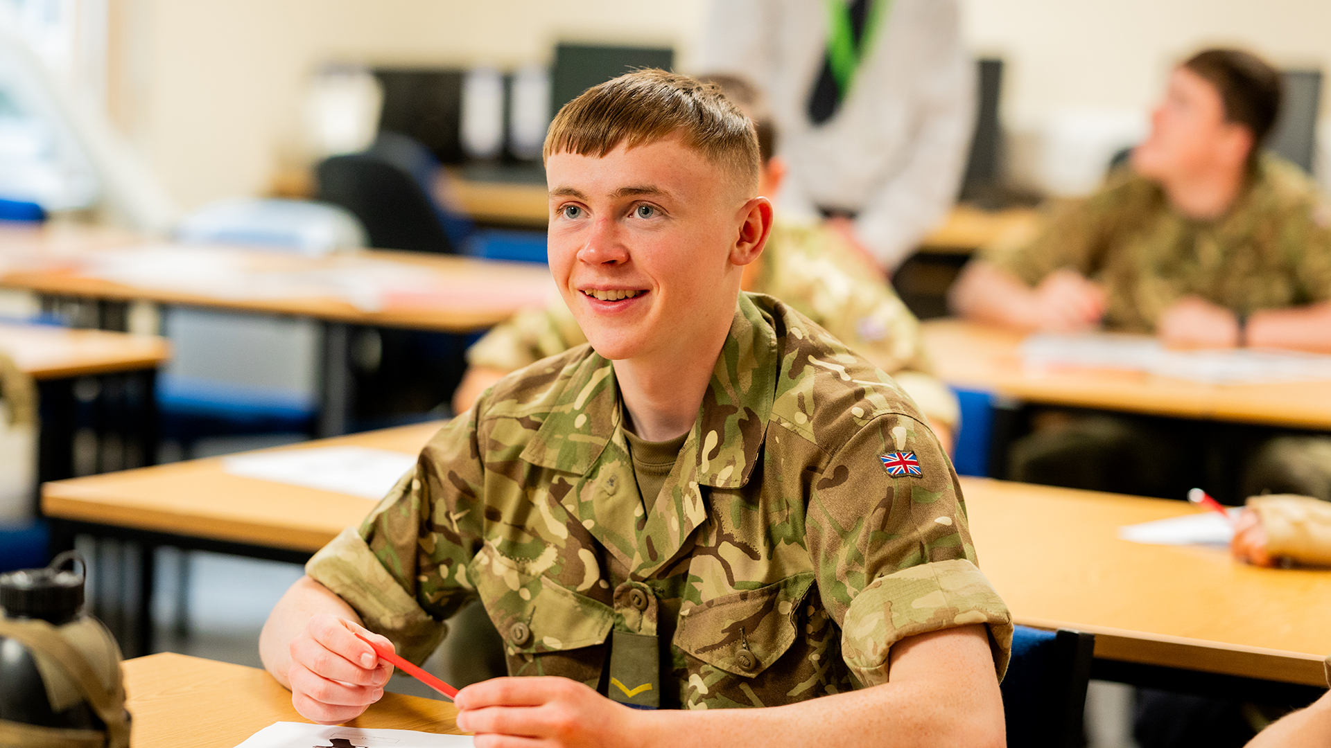 Male junior soldier in a classroom