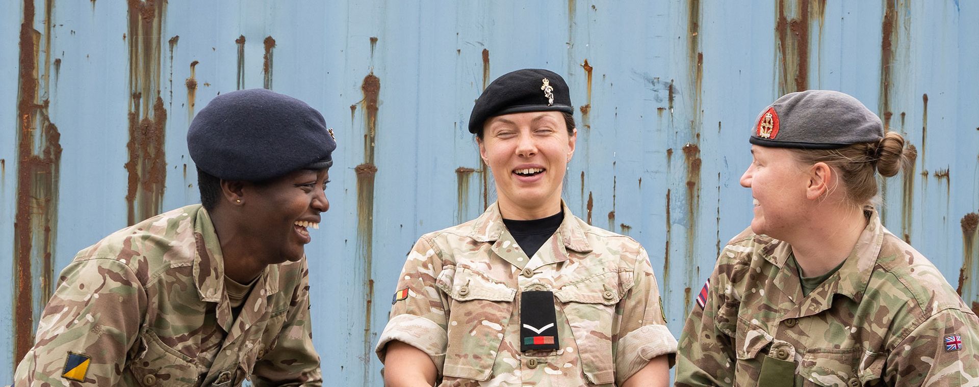 Female soldiers laughing