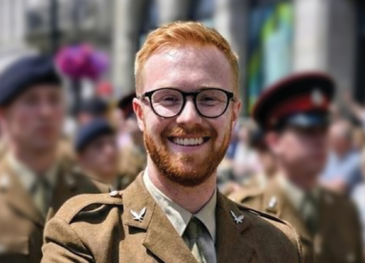 Smiling soldier in glasses