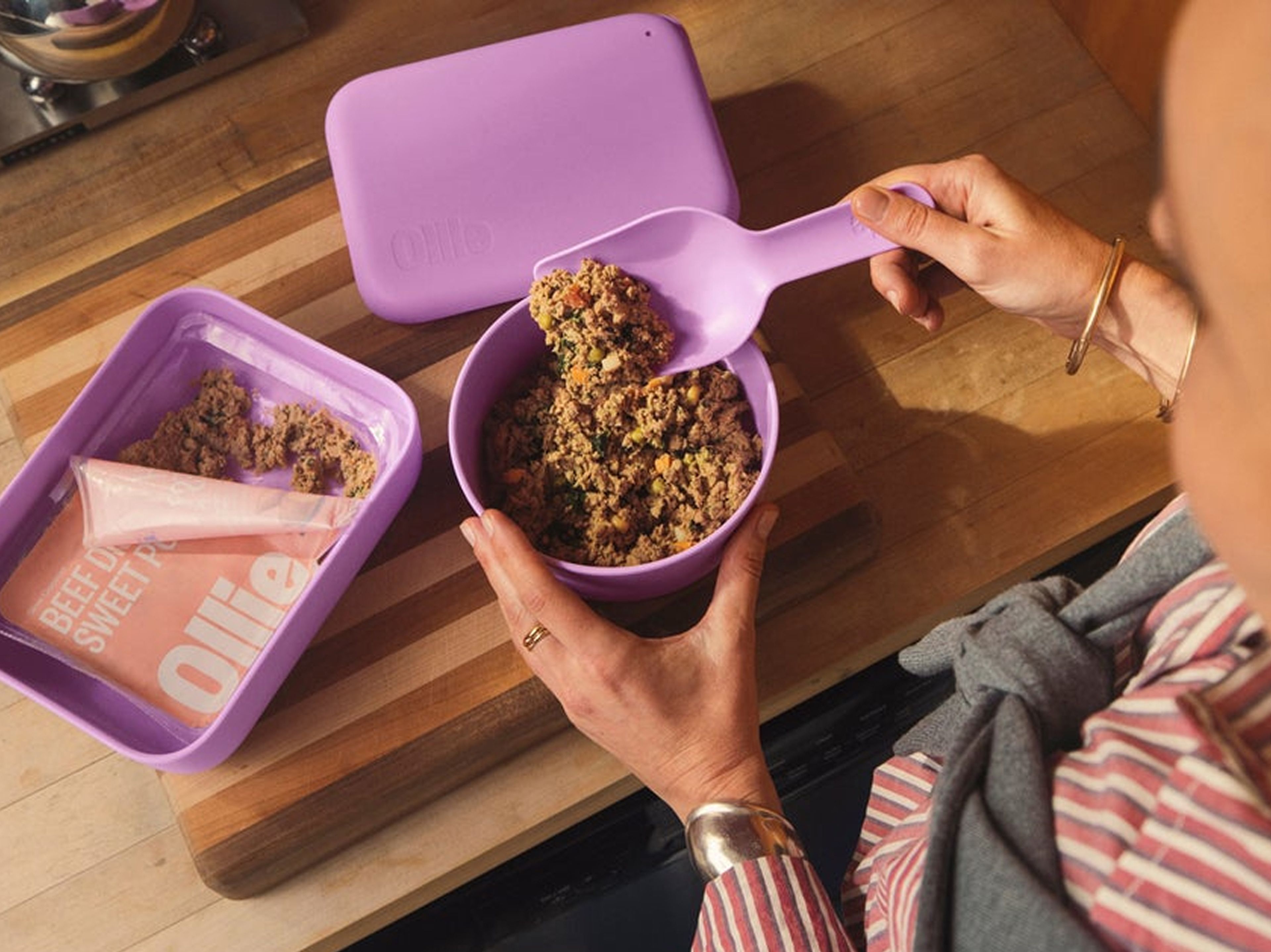woman serving fresh ollie food