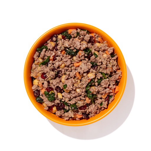 Yellow dog bowl filled with Ollie's lamb recipe