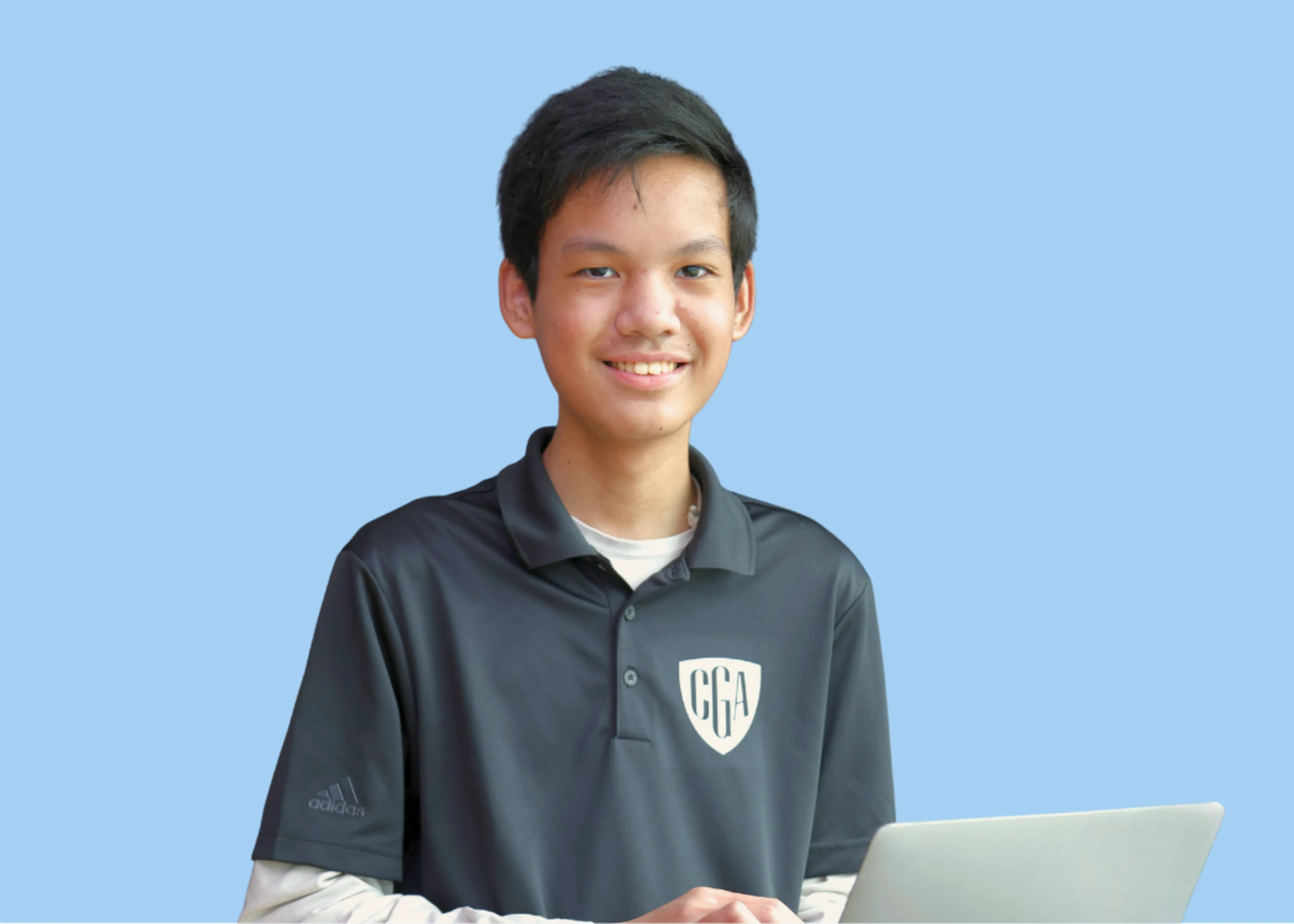 CGA student holding books