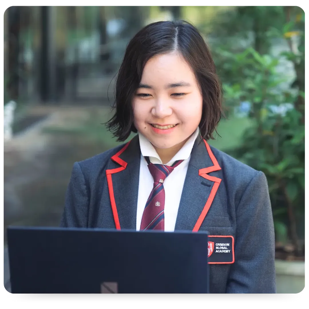 CGA online student from Japan attending virtual class on laptop