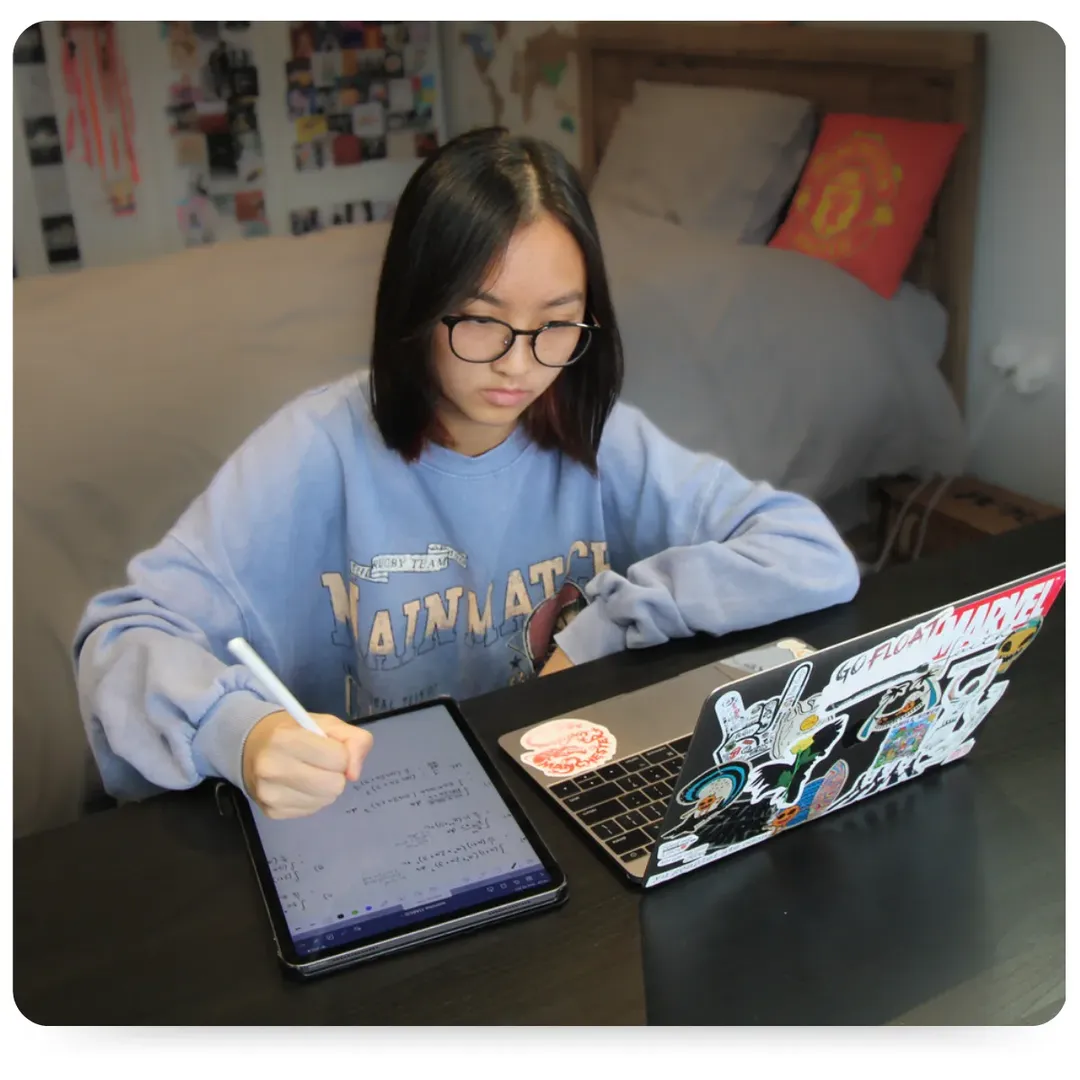 CGA Student on laptop