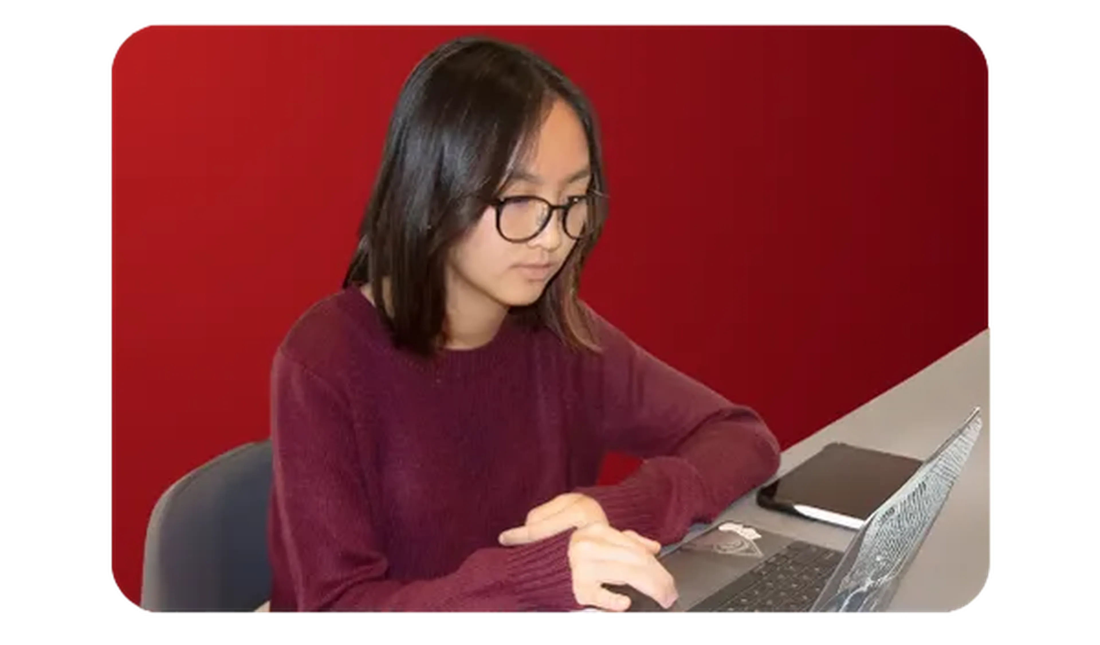 CGA student on laptop