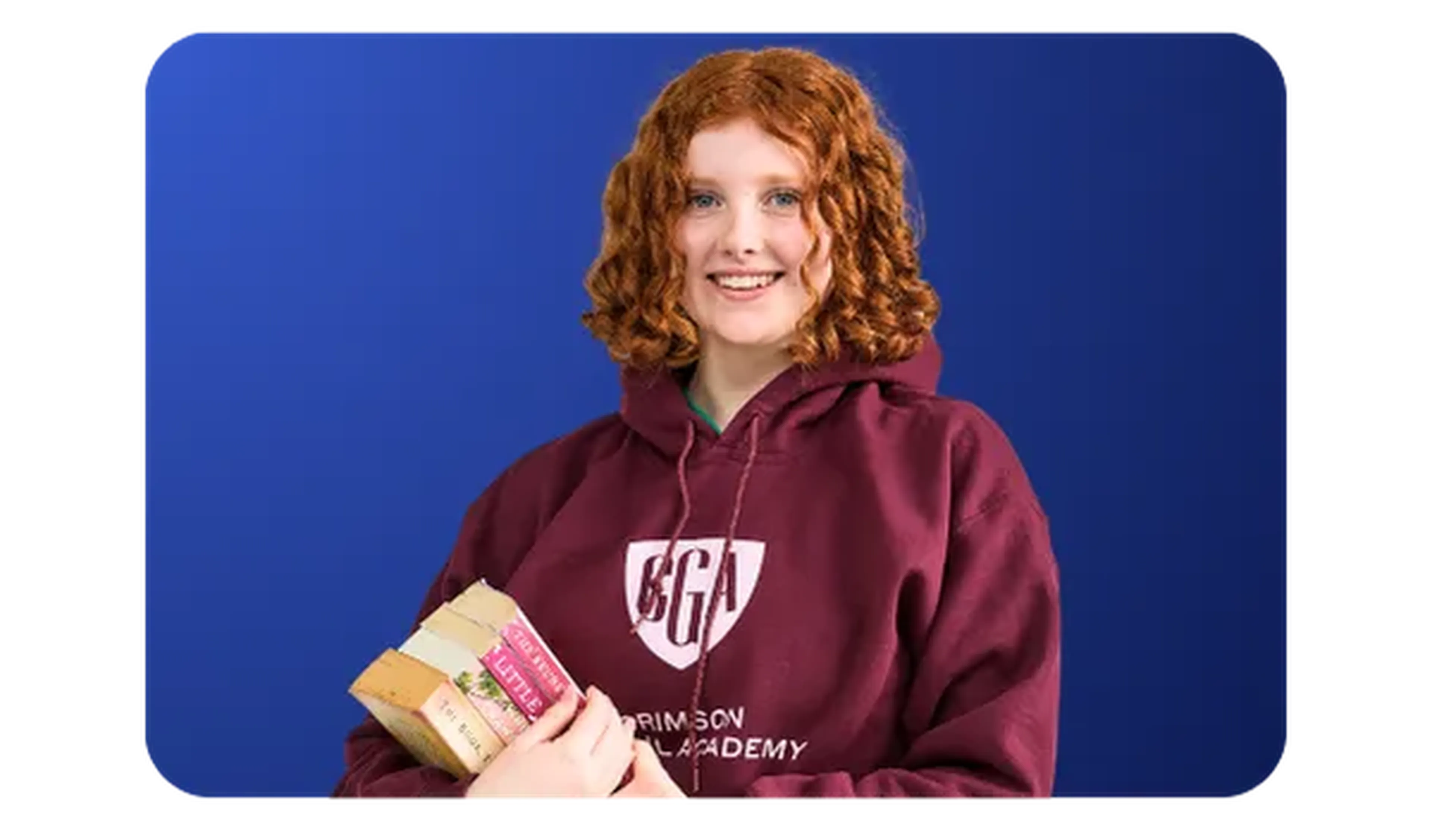 CGA student holding books