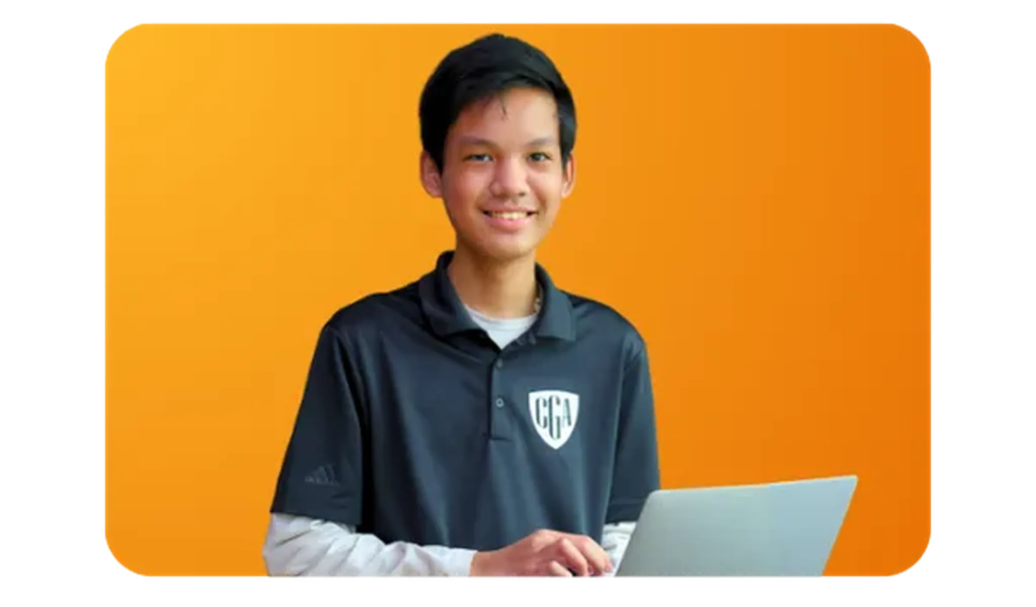 CGA student holding a laptop