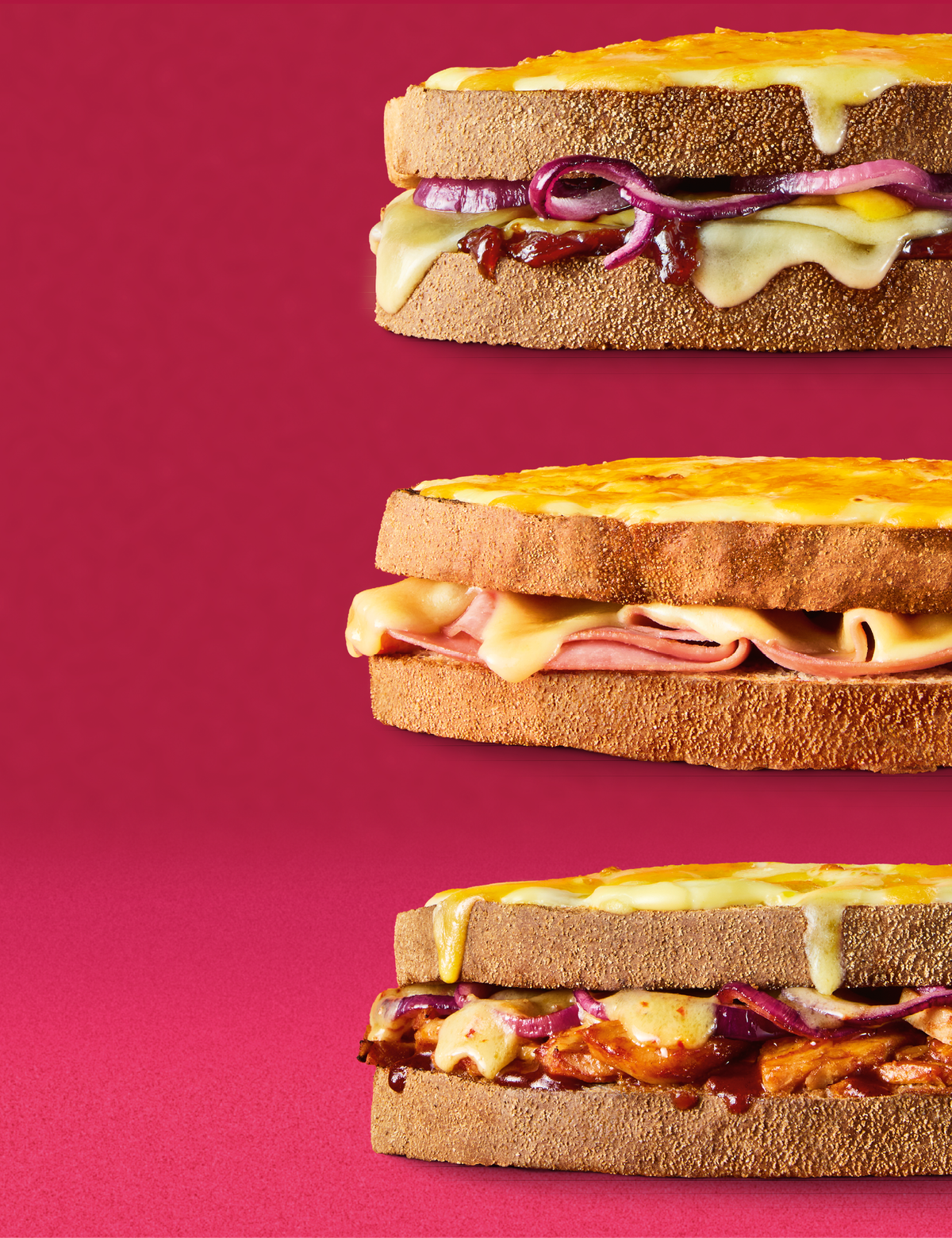 Three toasties on a red background