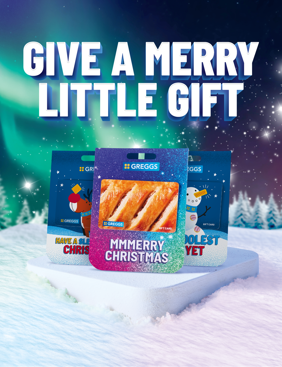 "Give a merry little gift" beside three festive gift cards on a snowy and brightly lit sky