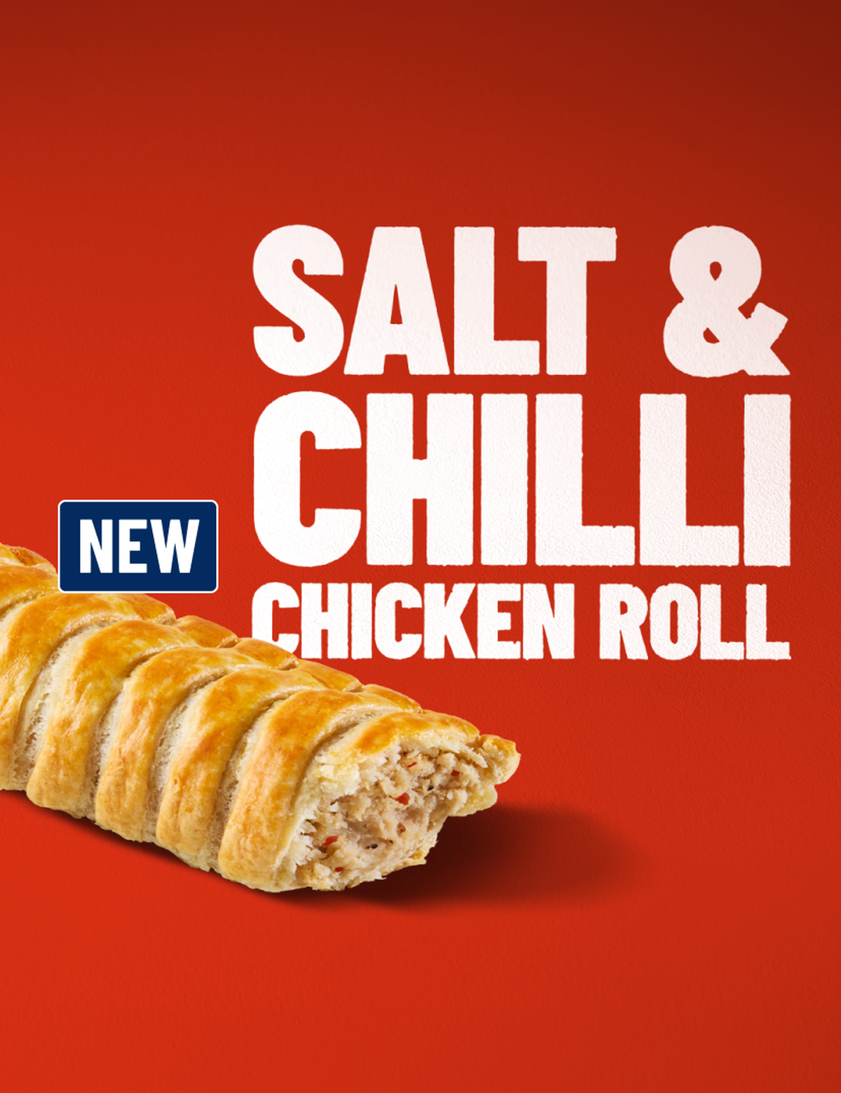 A perfectly baked Salt & Chilli Chicken Roll on red background labeled "New Salt & Chilli Chicken Roll."