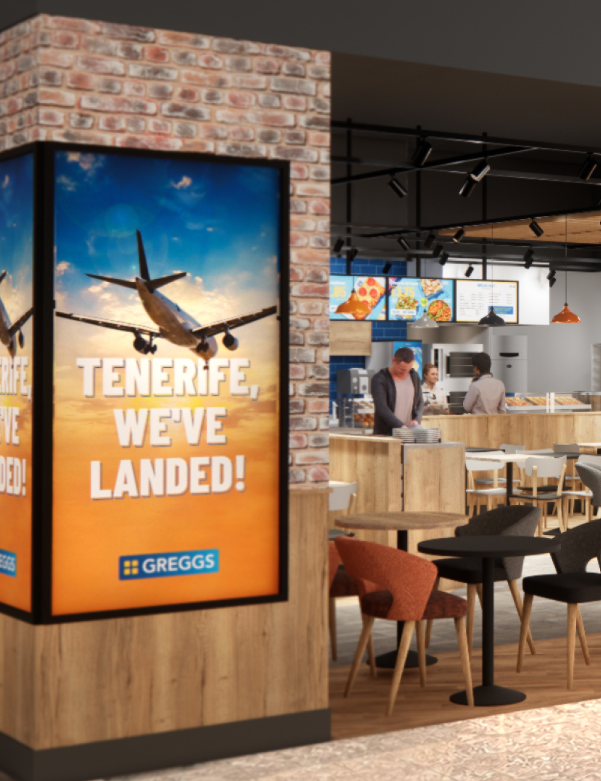 A Greggs shop in an airport with a poster reading "Tenerife, we've landed!"