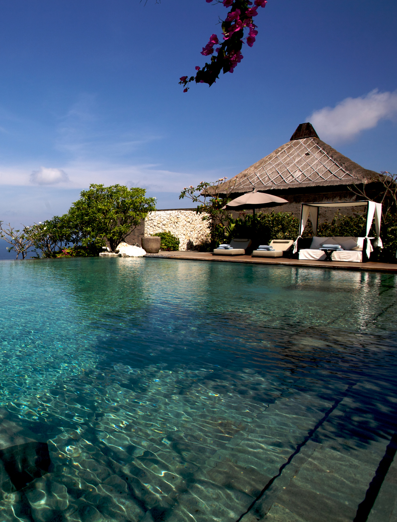 View over an infinity-pool at a resort in Bal