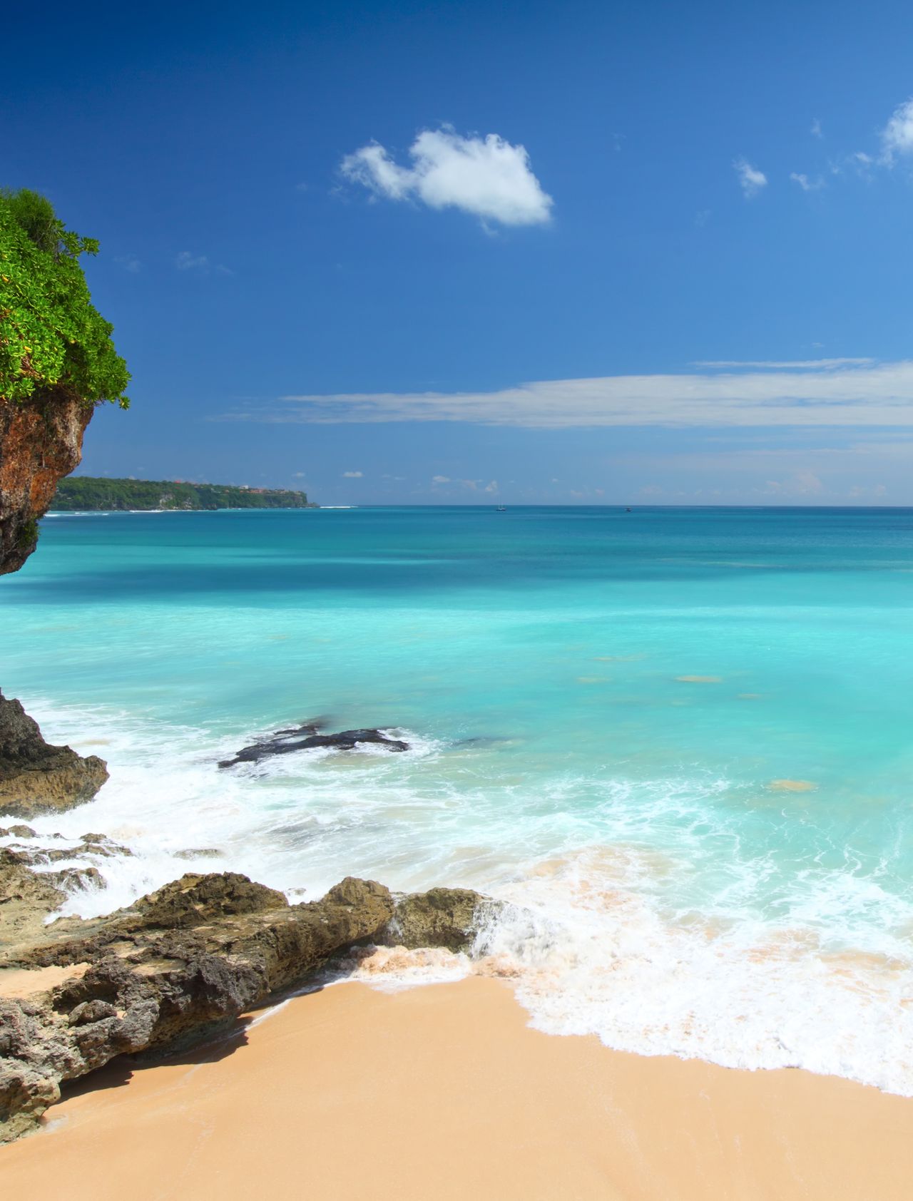 A white sandy beach in Bali, Indonesia.